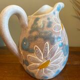 pitcher of daisies
