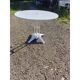 Garden table with a cast iron base and a metal top.