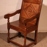 high-backed armchair from the 17th century in oak