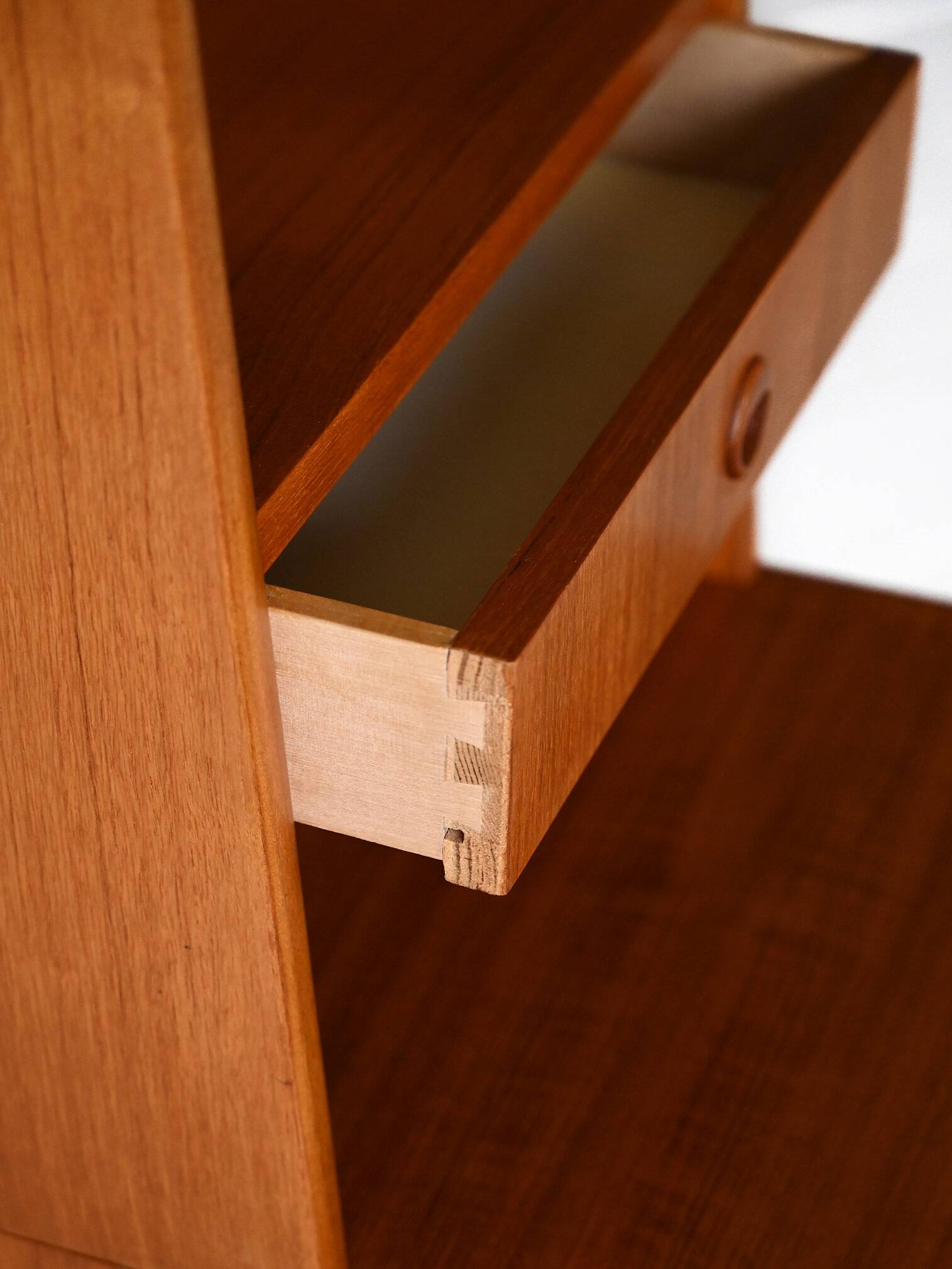 Fine teak bookcase with drawers