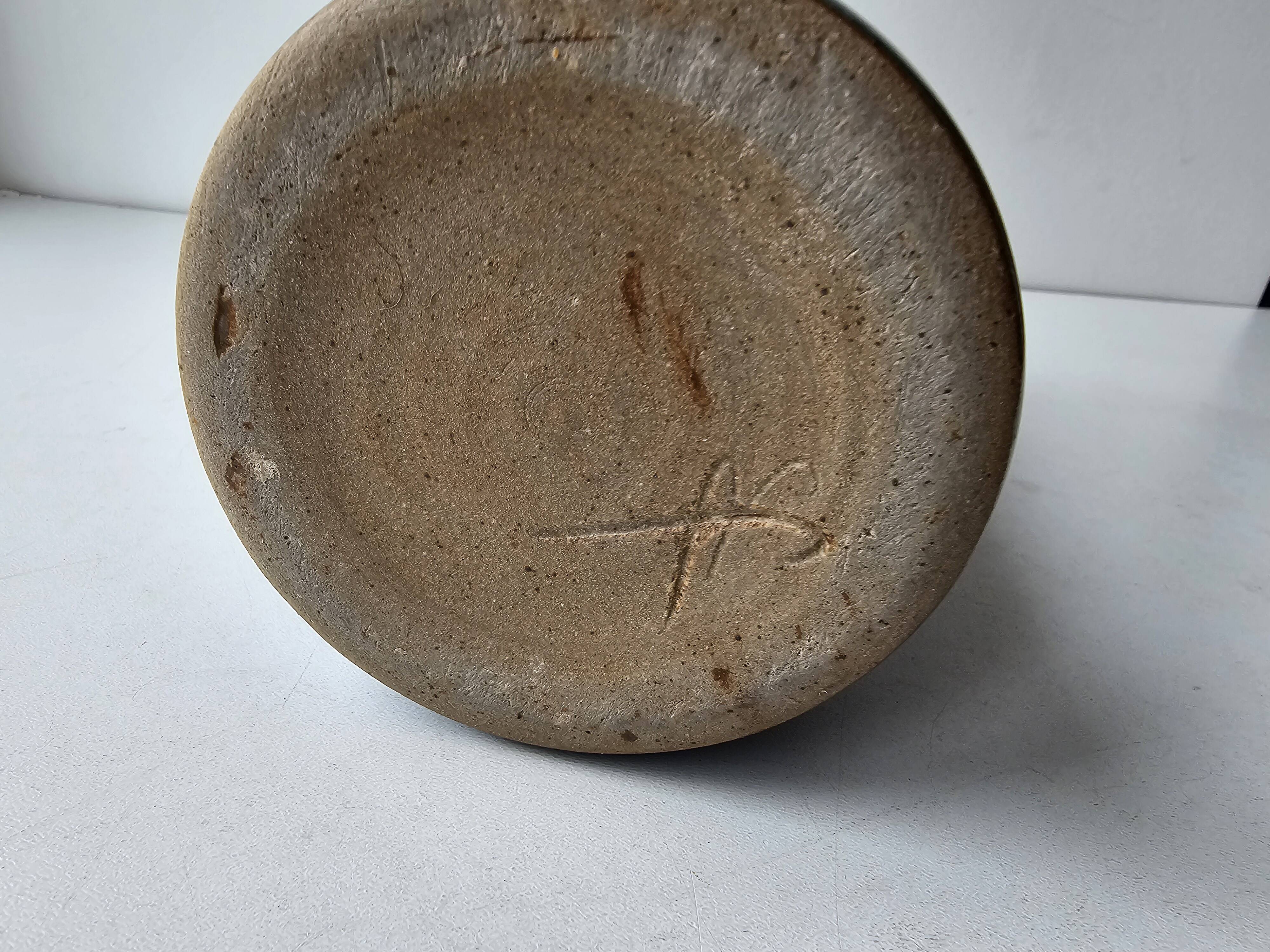 Blue ceramic vase with roller signed AB (signature to be identified)