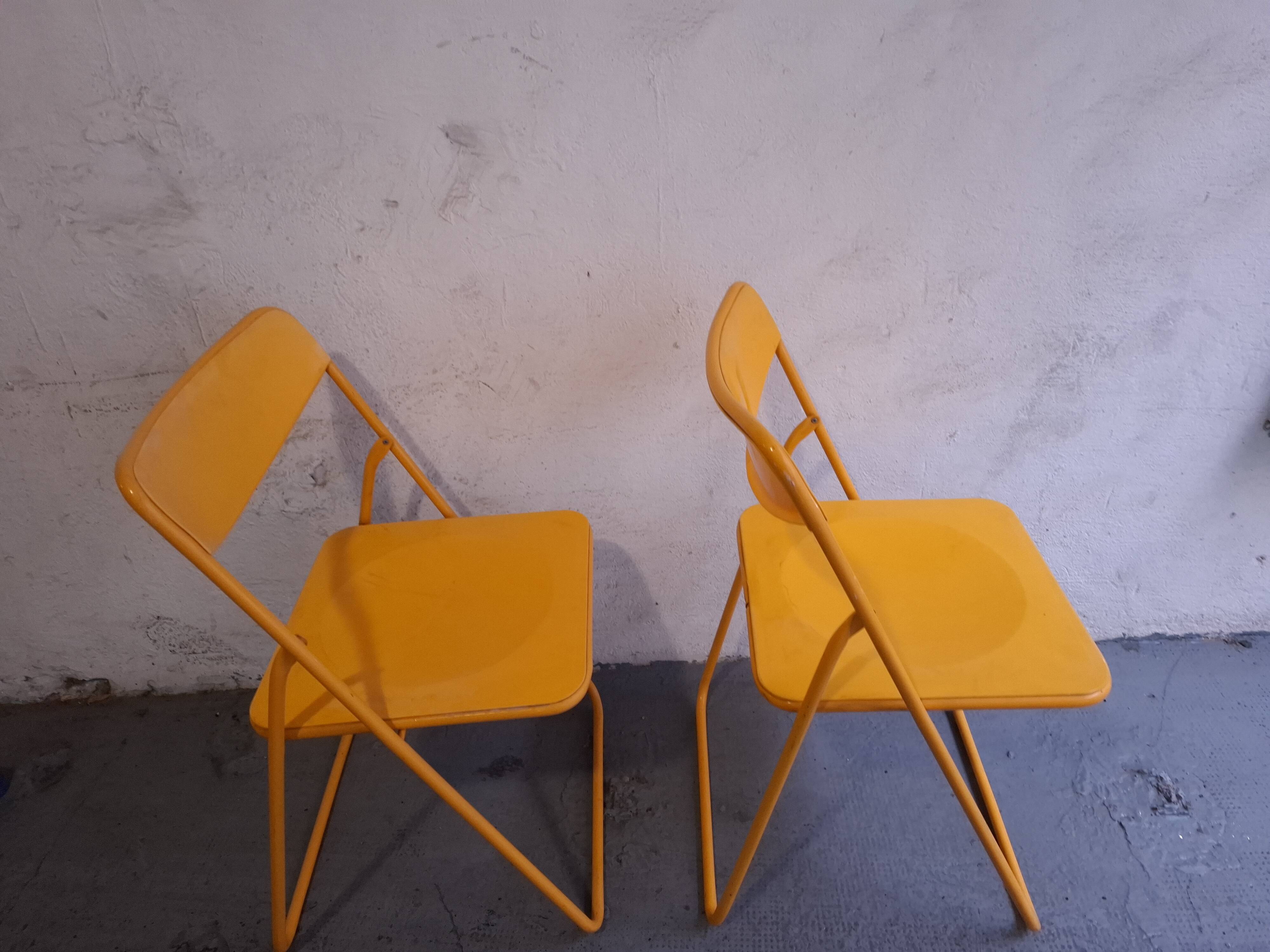 Two ikea folding chairs, niels gammelgaard