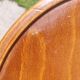 curved wooden bar stool