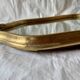 Antique beveled wall mirror in gilded solid wood
