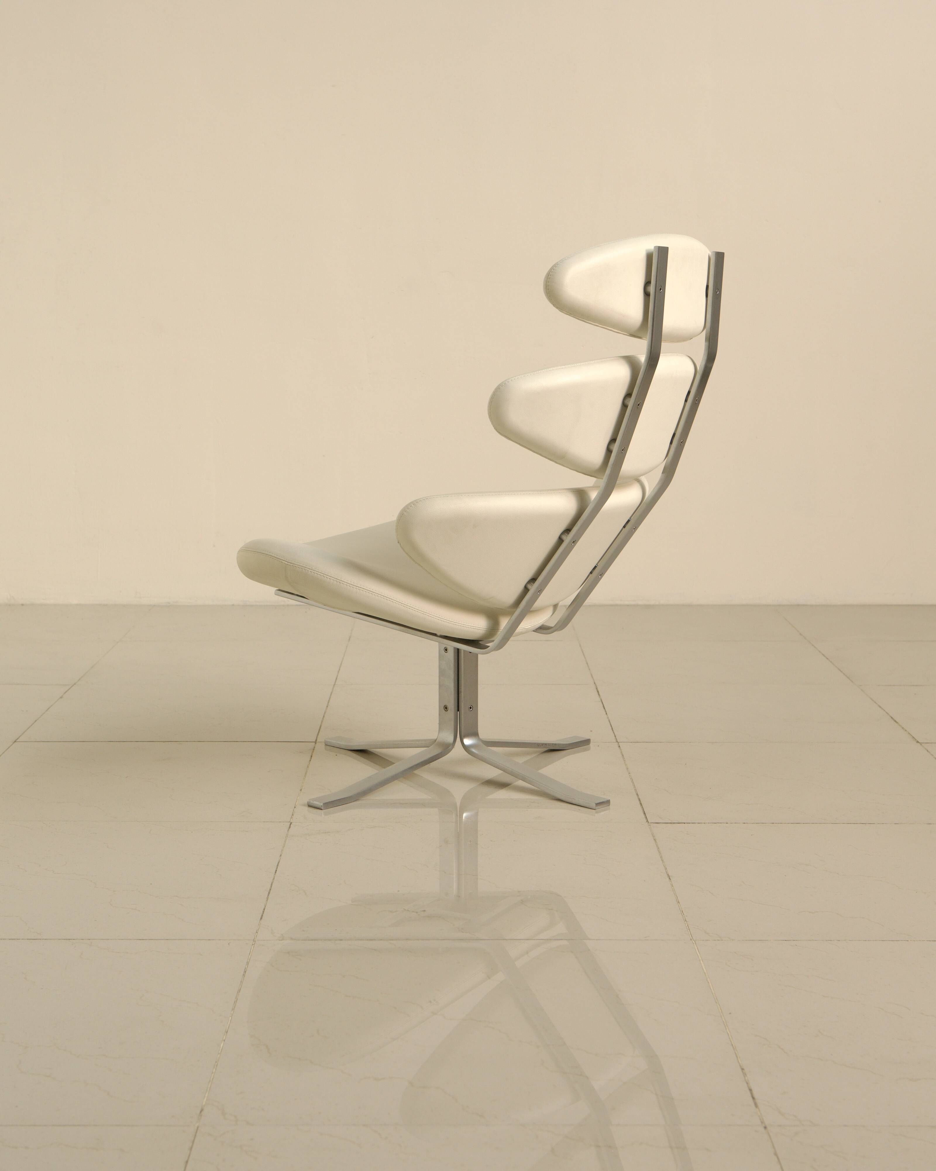 "Corona" lounge chair in off-white grained leather by Poul Volther for E