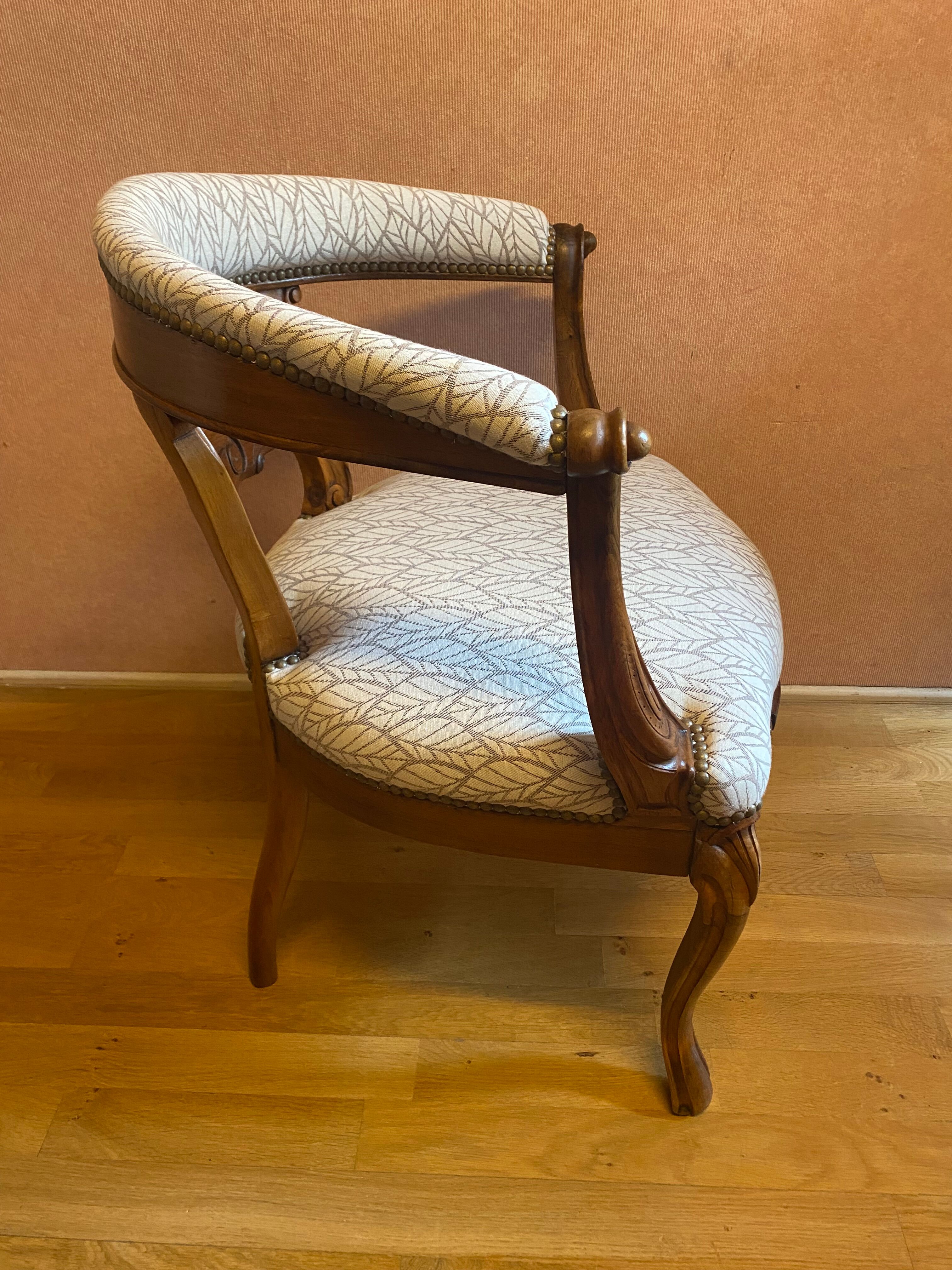 office armchair in walnut, nineteenth century, fully trimmed and reupholstered.