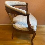 office armchair in walnut, nineteenth century, fully trimmed and reupholstered.