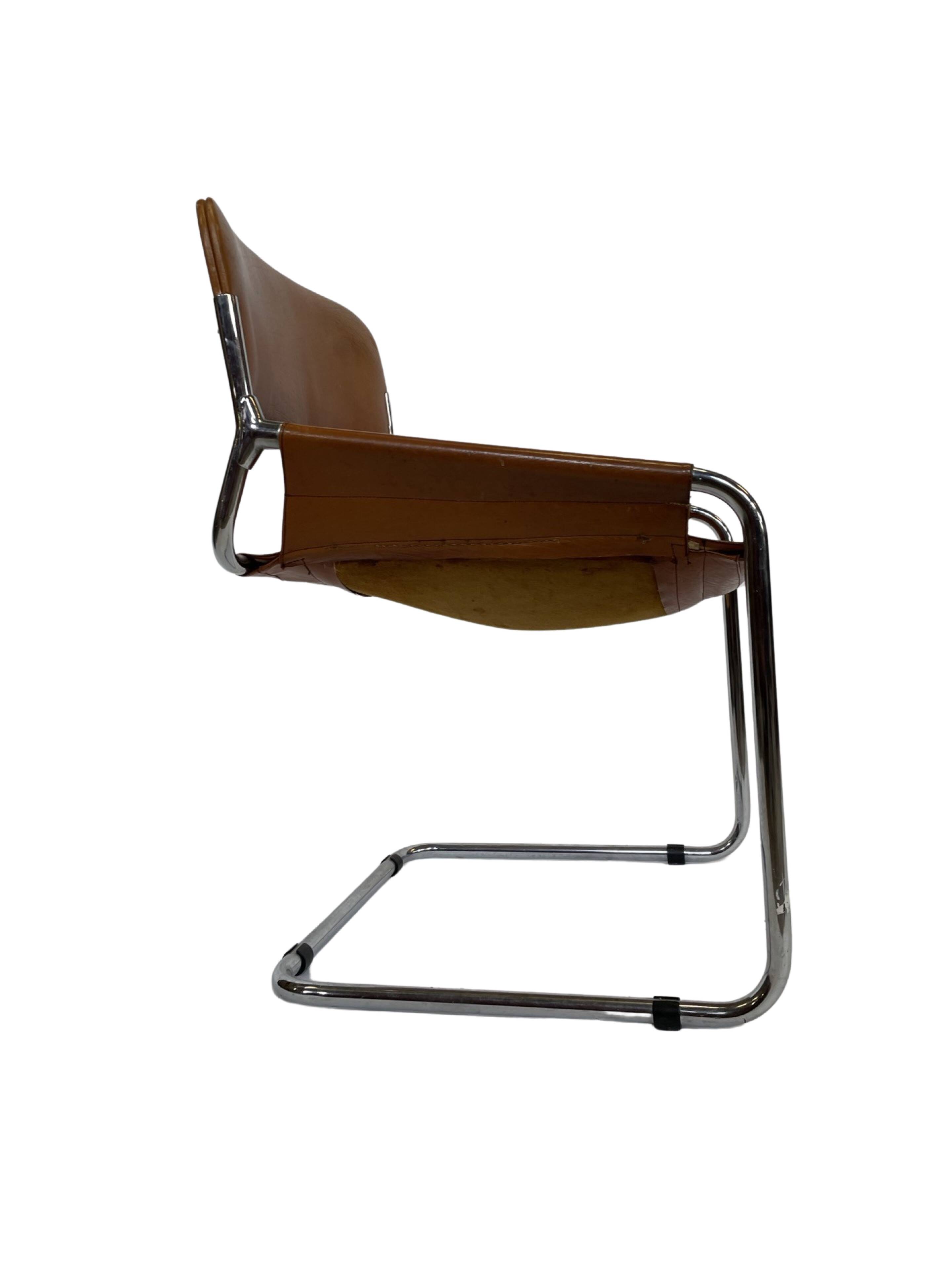 vintage dining room chair in cognac leather and chrome 1970s Italy