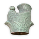 Ethnic anthropomorphic vase in patinated terracotta