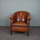 Leather club chair with black piping