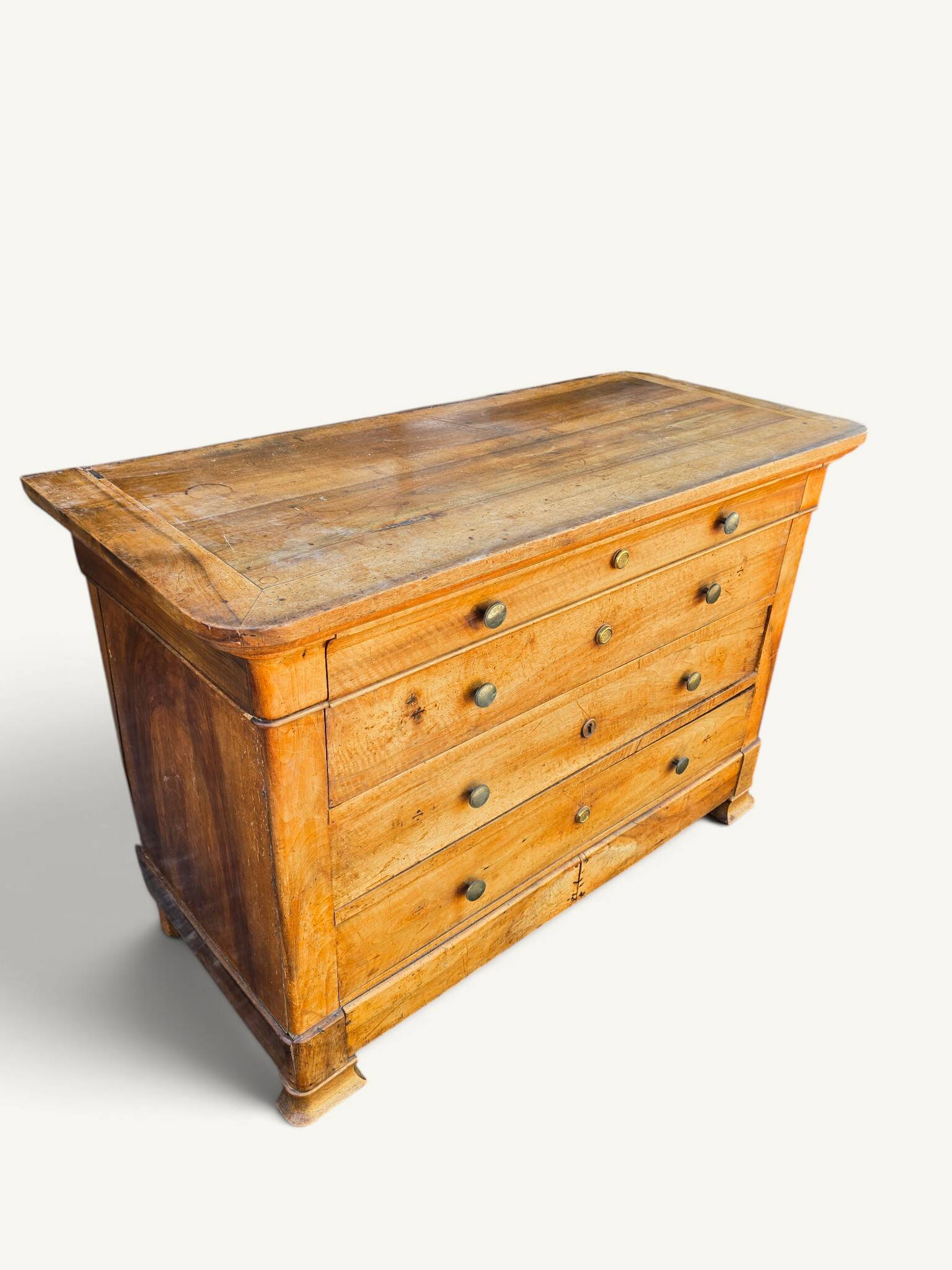 Commode Louis-Philippe en bois blond 4 tiroirs, XIXe