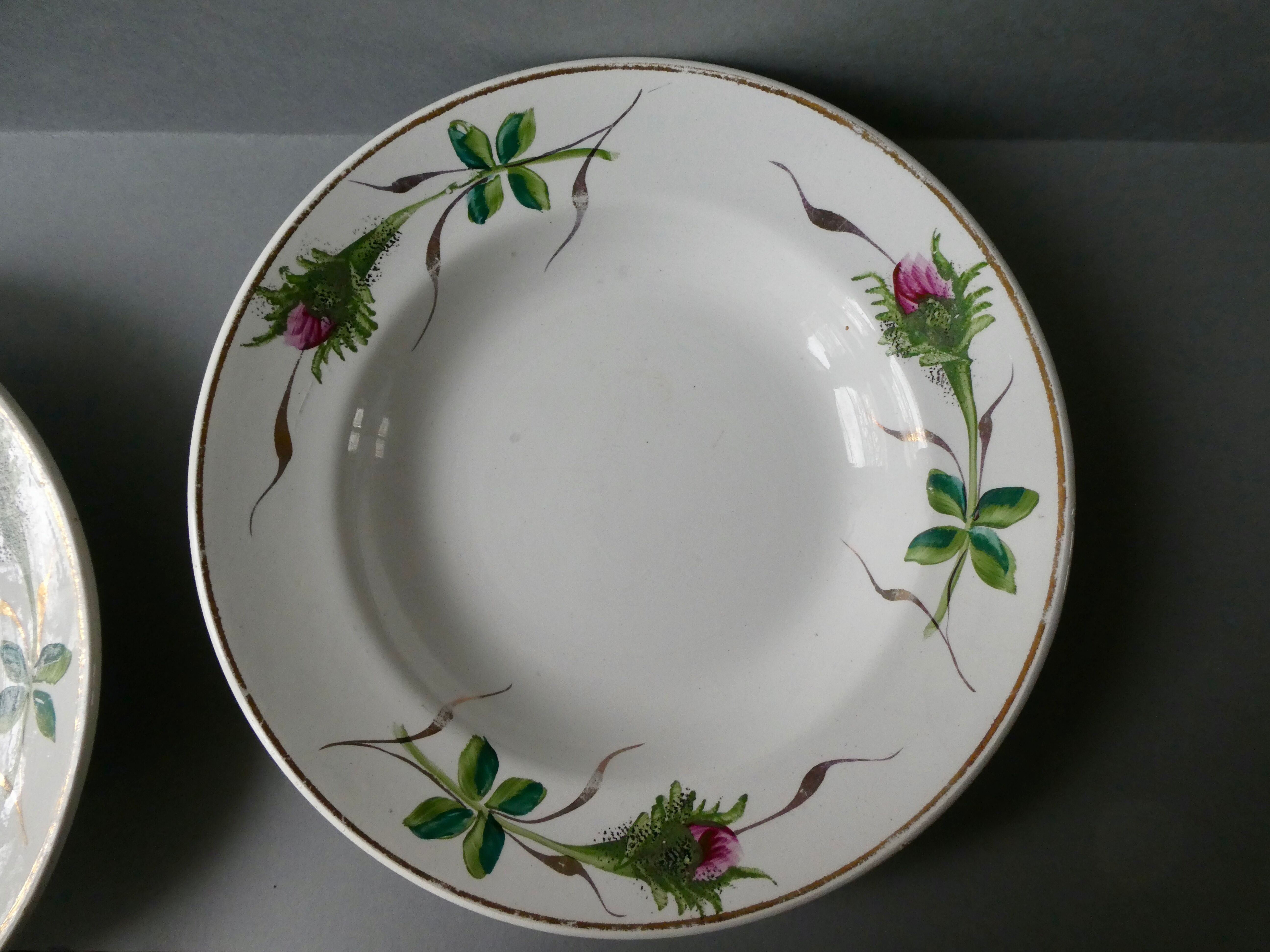 Lot of 2 hollow plates Moulin des Wolves, painted décor