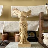 "Winged Victory of Samothrace", beige plaster statuette