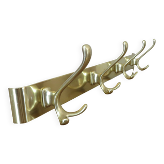 Large wall-mounted coat rack in gold aluminum, 60s-70s