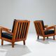Pair of Belgian lounge chairs in solid oak with leather cushions