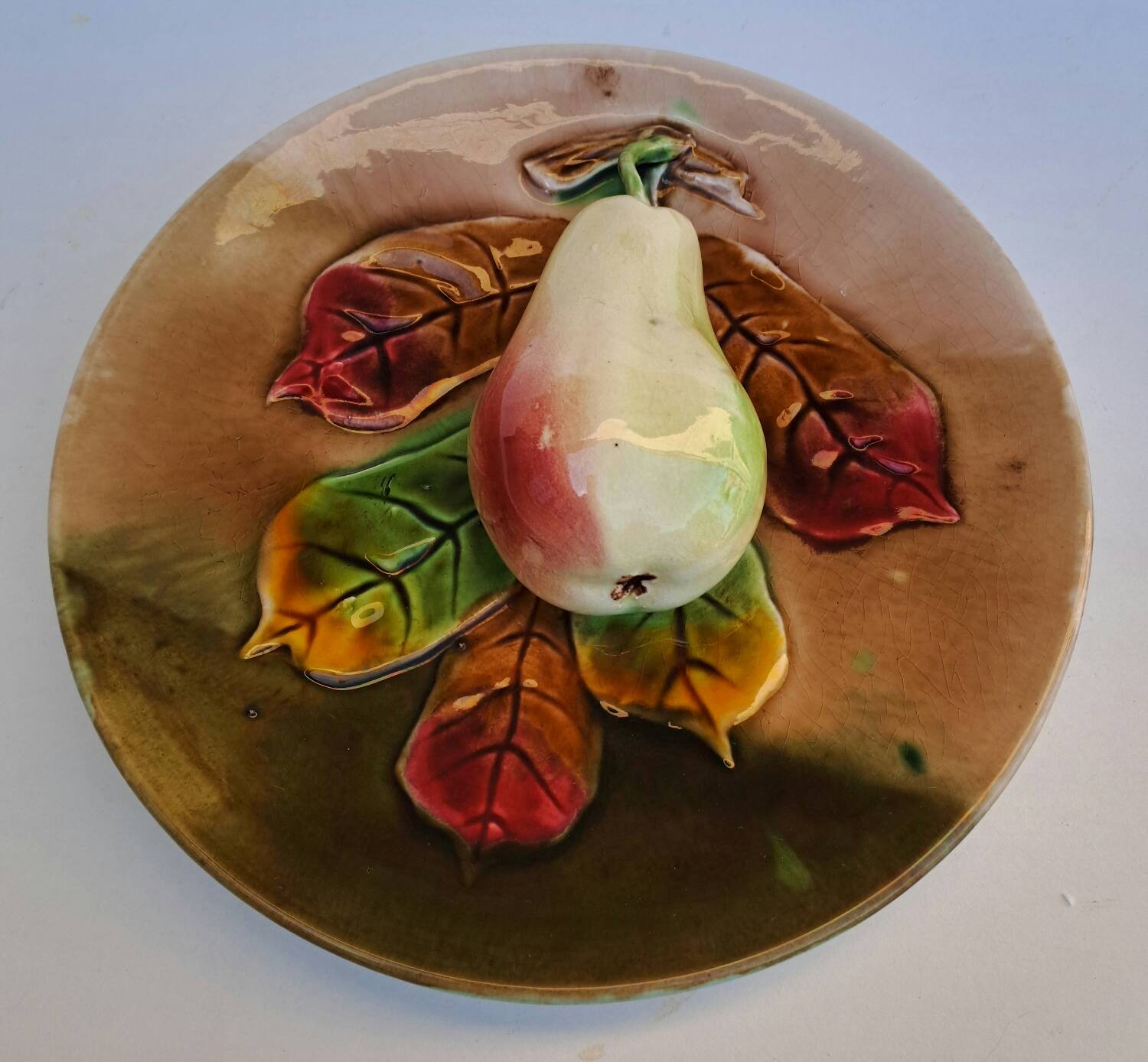 Pear slip plate in relief