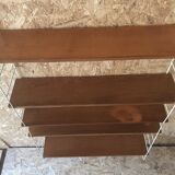 Vintage modular wall shelf with 4 supports and 5 levels.