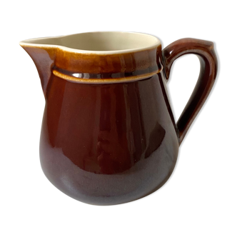 Antique brown ceramic pitcher