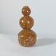 Unique vintage ceramic vase in the shape of a decorative sphere.