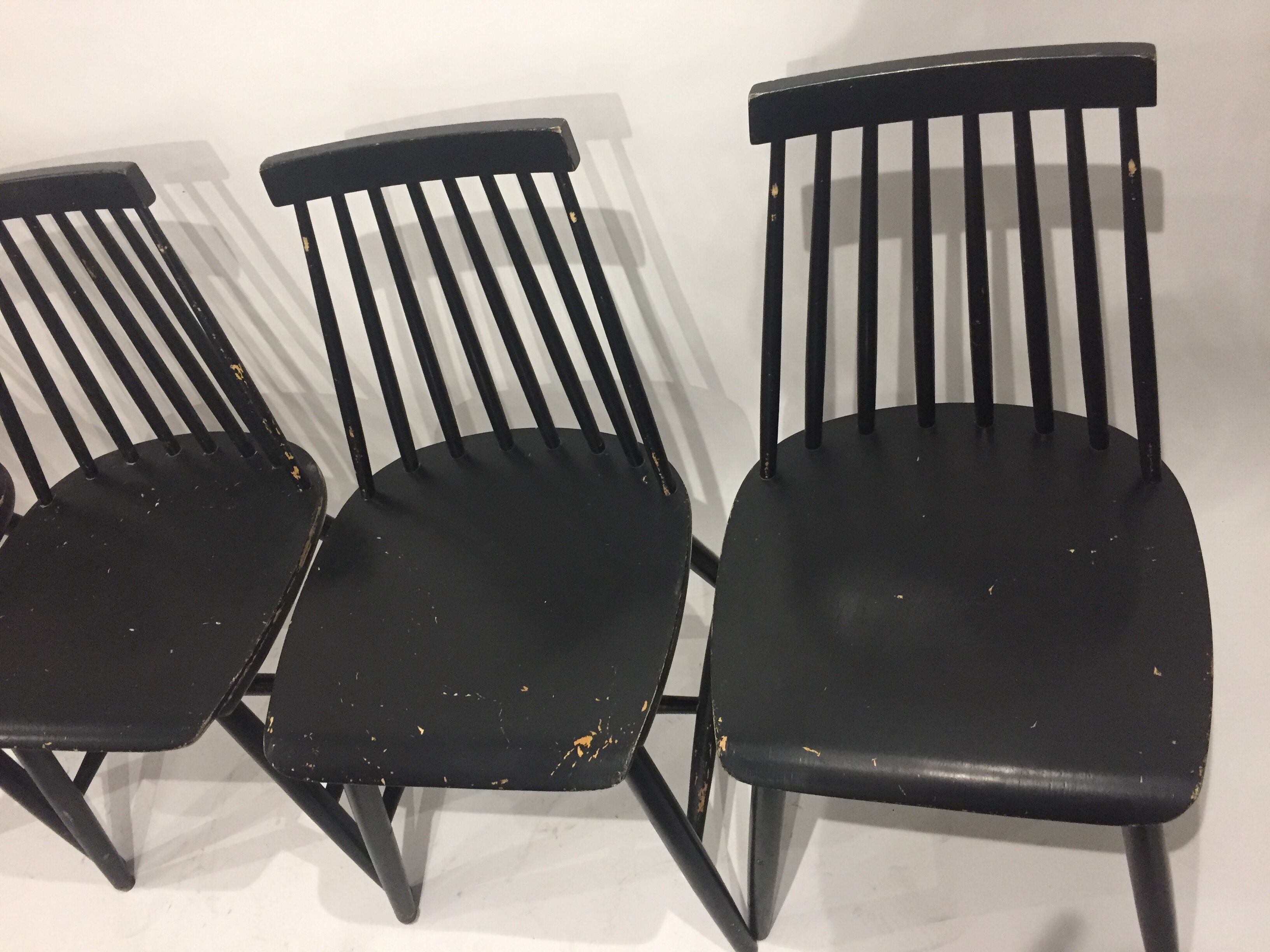 Series of 4 black Scandinavian chairs