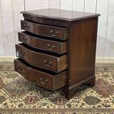1950s English mahogany chest of drawers with one shelf