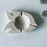 Travertine fish pocket emptier