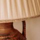 Large ceramic table lamp from West Germany with a pleated shade.