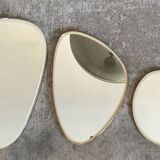 Trio of asymmetrical free-form mirrors from the 60s and 70s