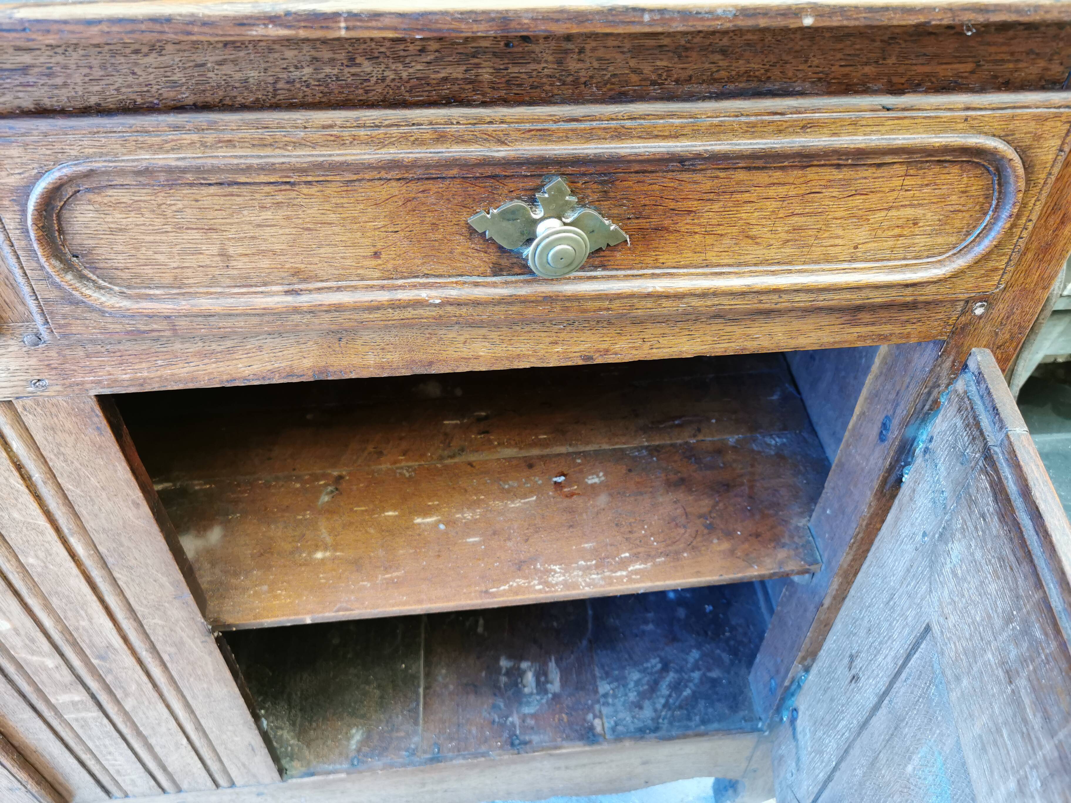 Old low buffet, 19th in rustic solid oak, carved and molded
