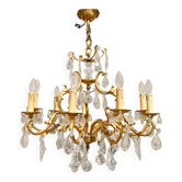 Monumental 9-light chandelier in gilded bronze and crystal suspension.