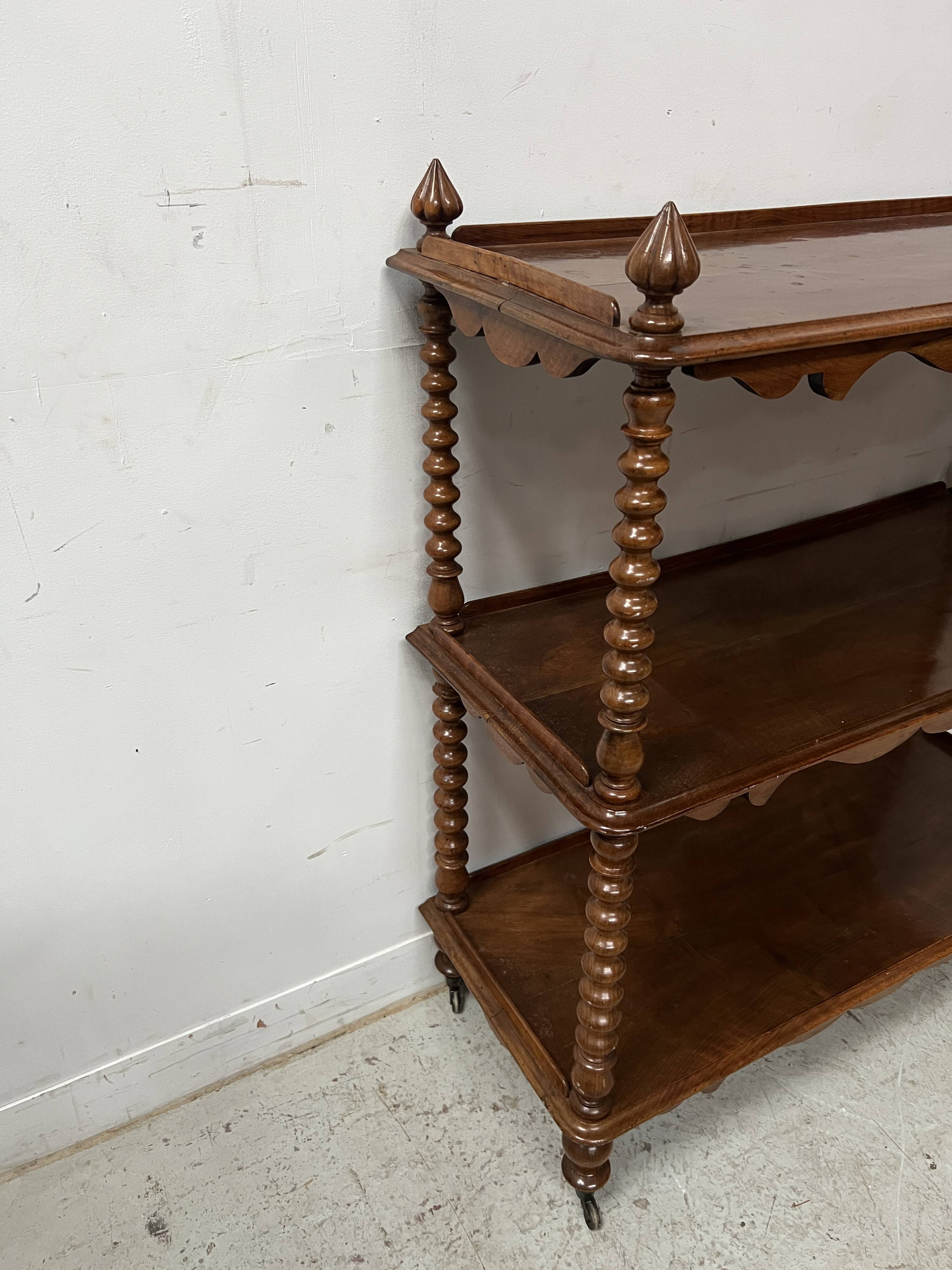 Napoleon III console table with three shelves in mahogany and veneer, 19th century
