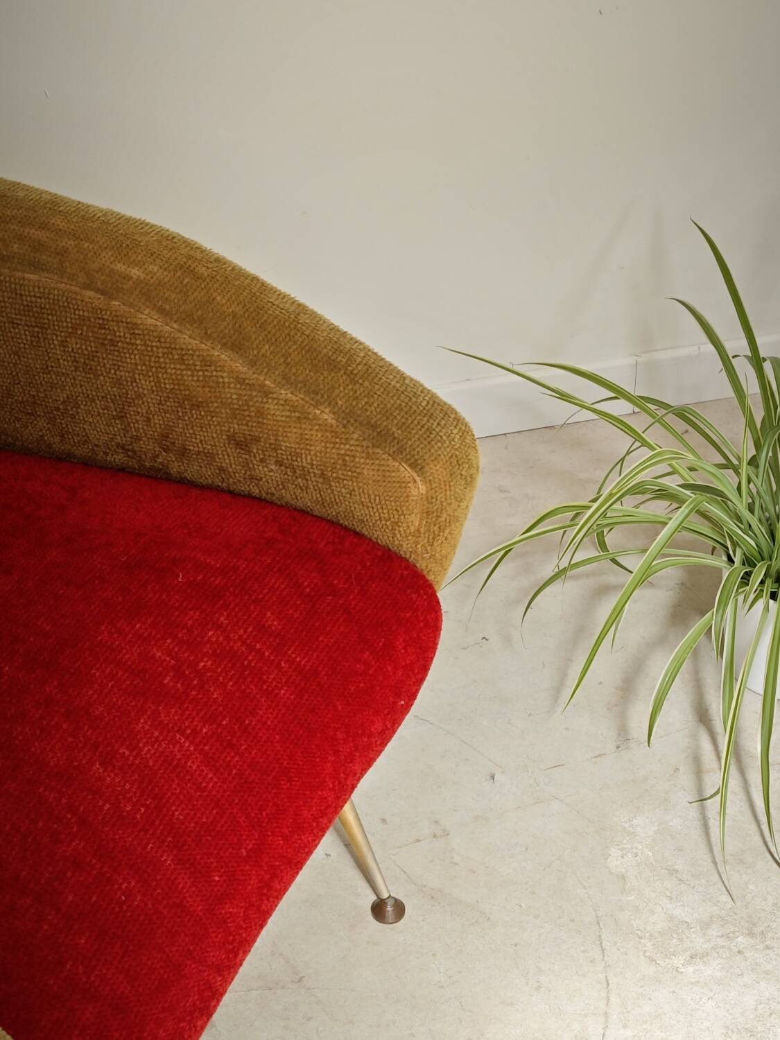 Red and mustard yellow fabric armchair in 1970s style