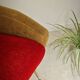 Red and mustard yellow fabric armchair in 1970s style