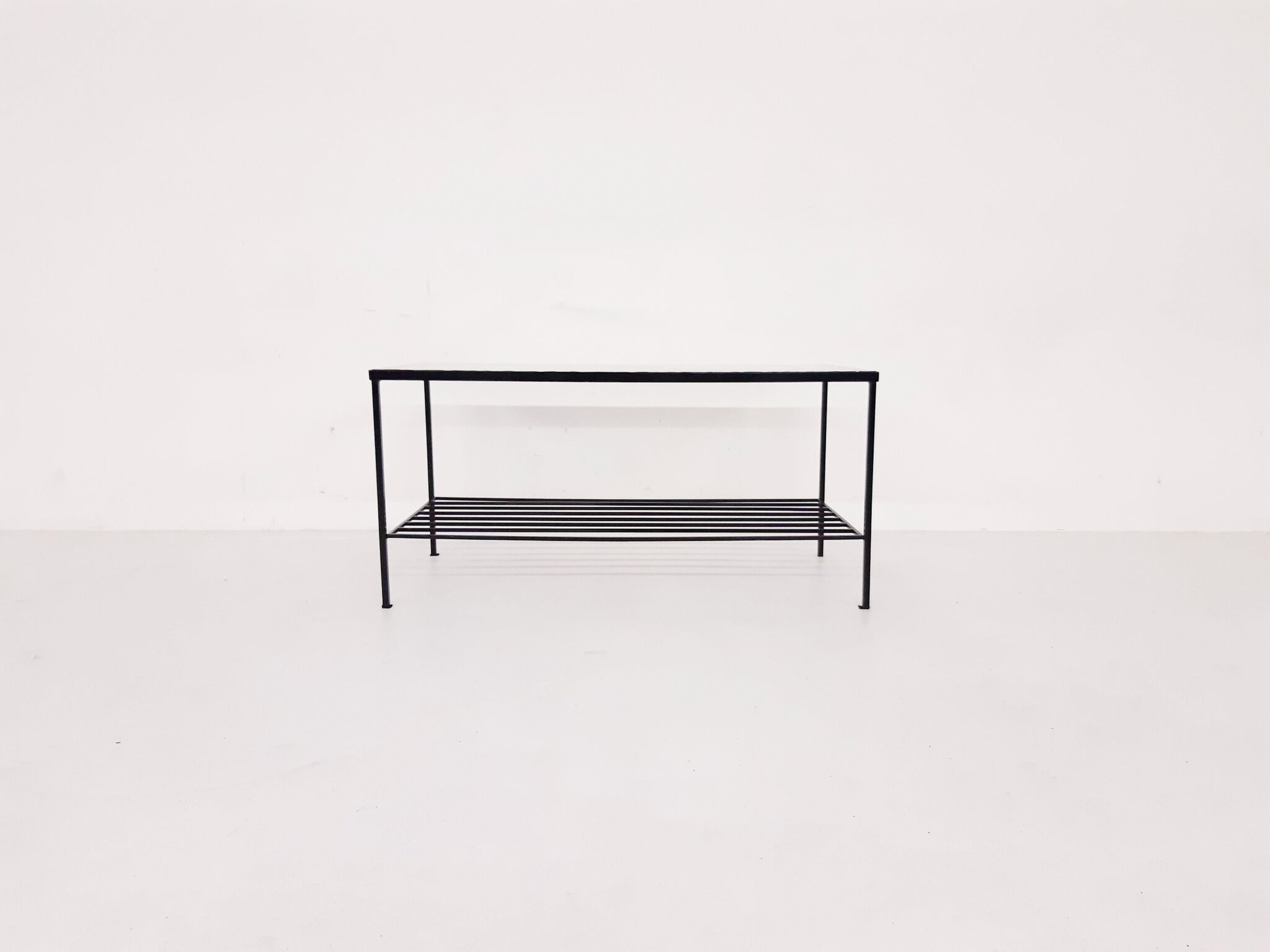 Mid-century modern minimalistic metal and glass coffee table