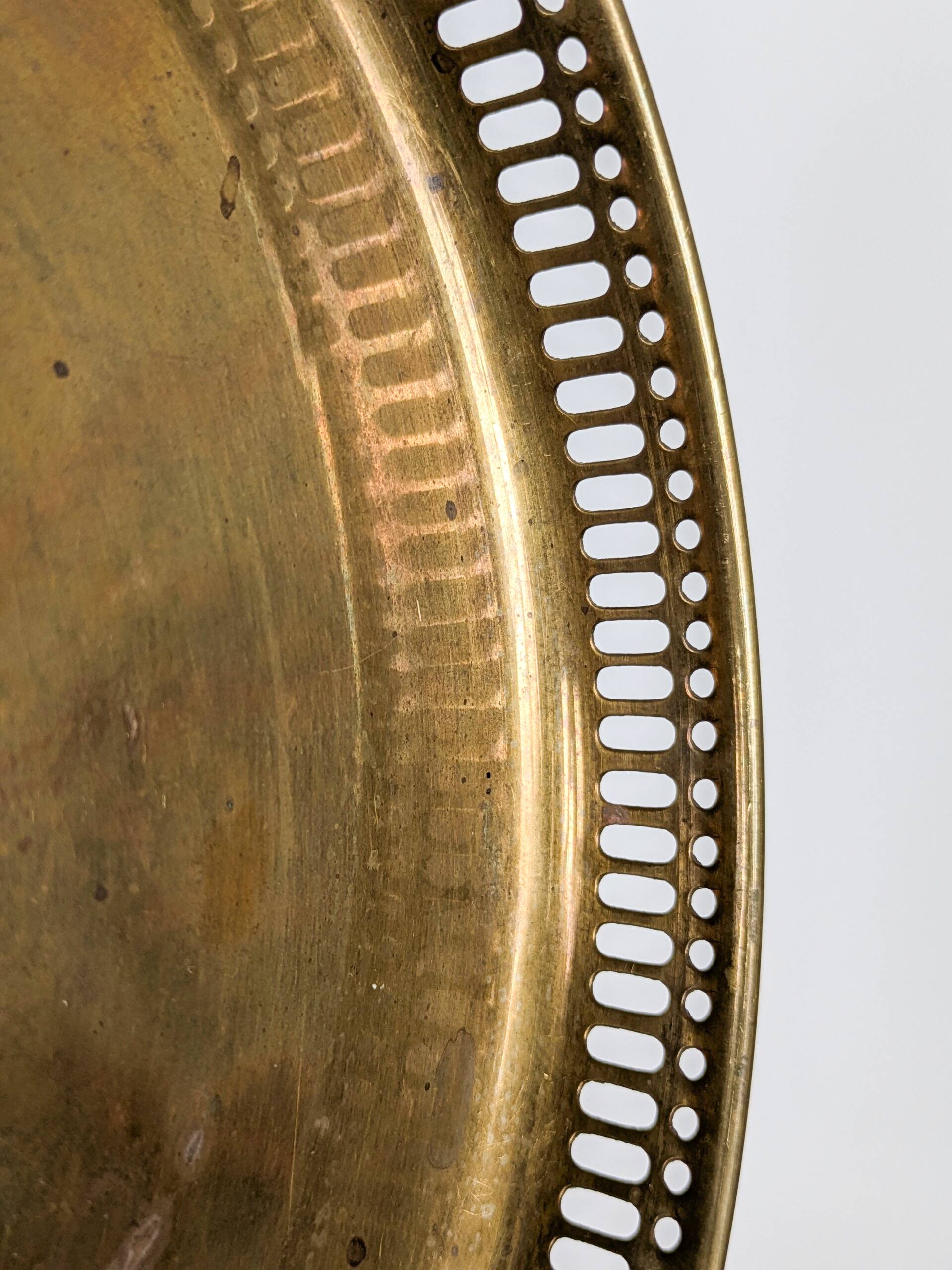 Vintage decorative brass tray, pierced edge and floral handles.