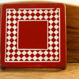 Checkered trivet, enamelled sheet metal
