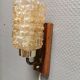 Small, stylish wall lamp with rosewood suspension and hard pressed glass