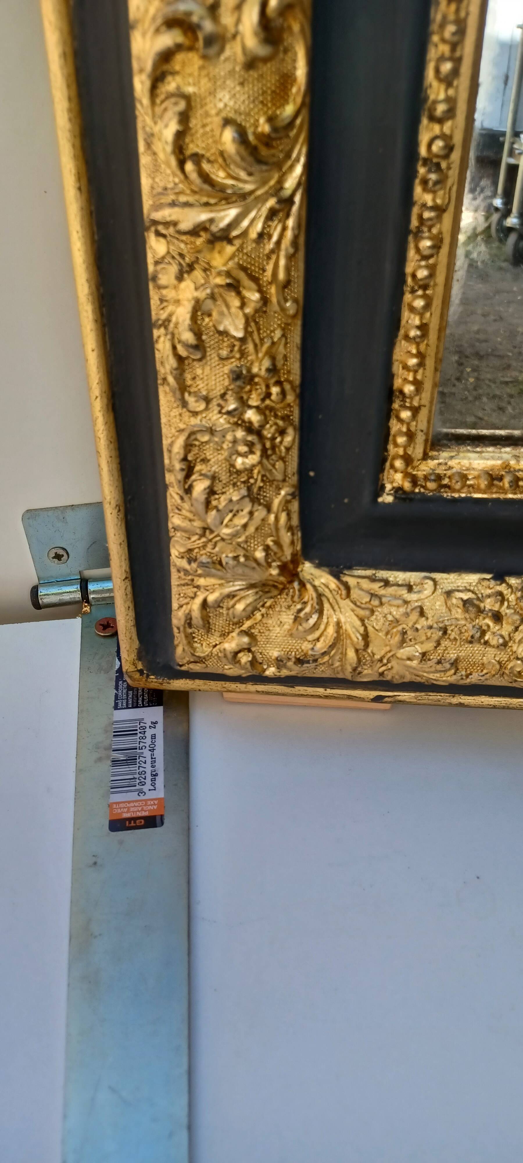 Louis-Philippe mirror, gilded and grey patina, circa 1890.