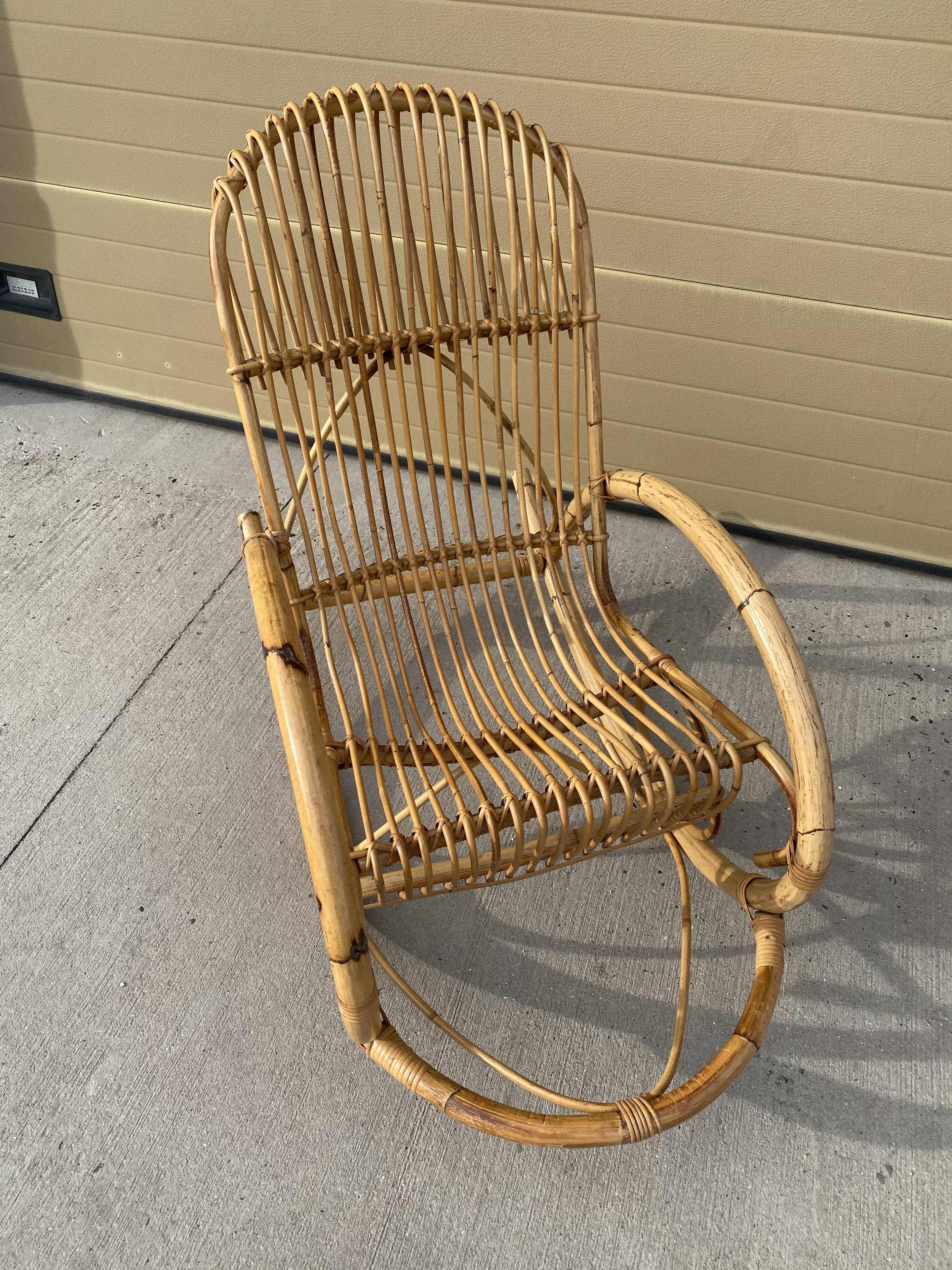 Rocking-chair in rattan circa 1960