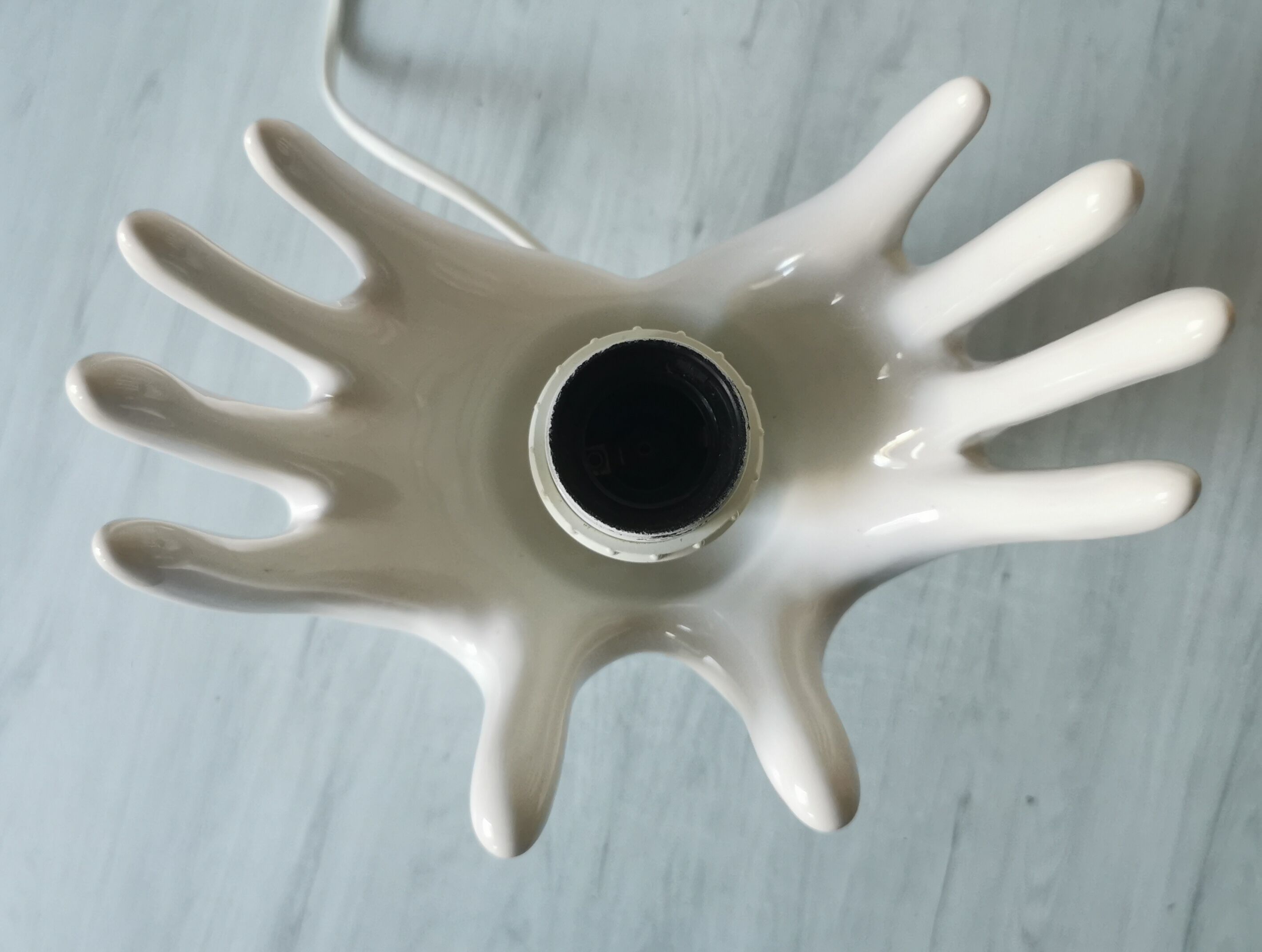 White ceramic hand lamp