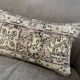 Coussin en tapis antique tissé à la main