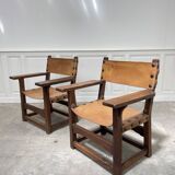 Pair of leather and walnut armchairs from the 1950s