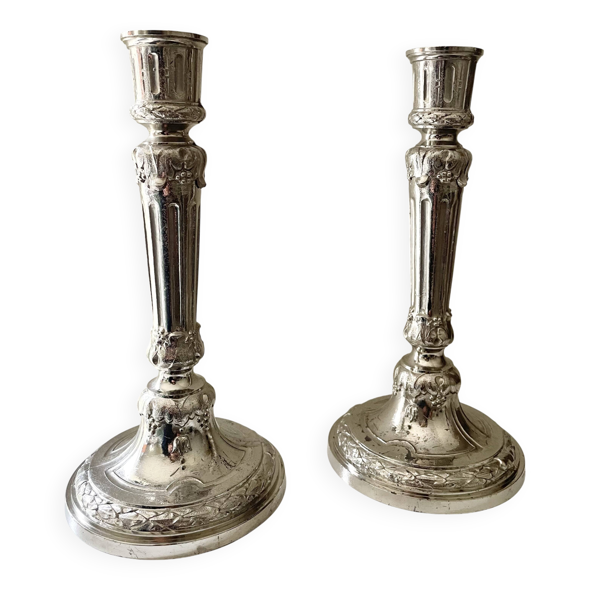 Antique silver-plated candlesticks in classic style