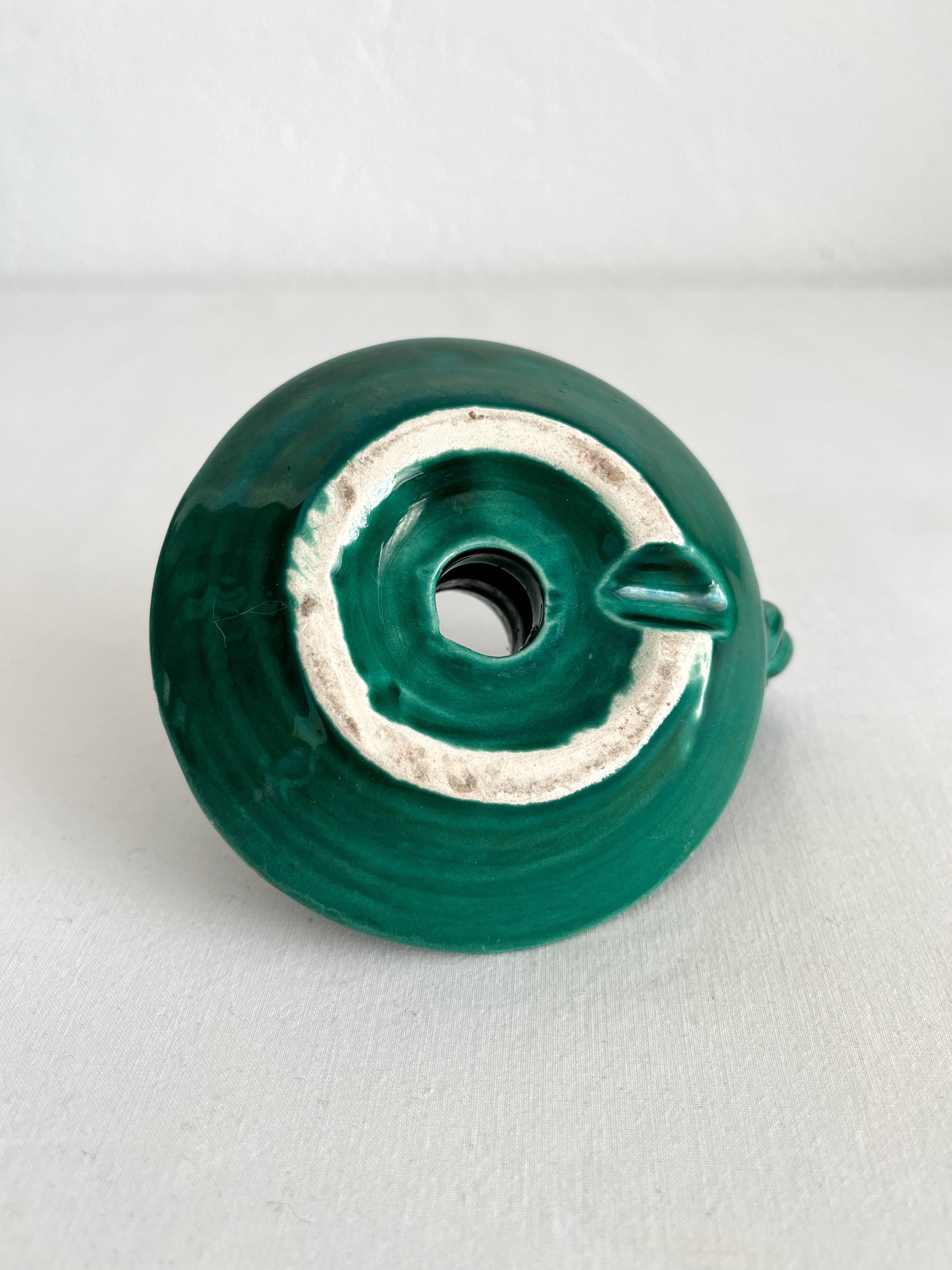 Vintage green ceramic candle holder with twisted handle