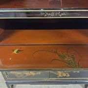 Vintage red / gold Chinese lacquer cabinet with flowers and birds