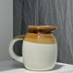 Small two-tone white and brown pitcher Made in China