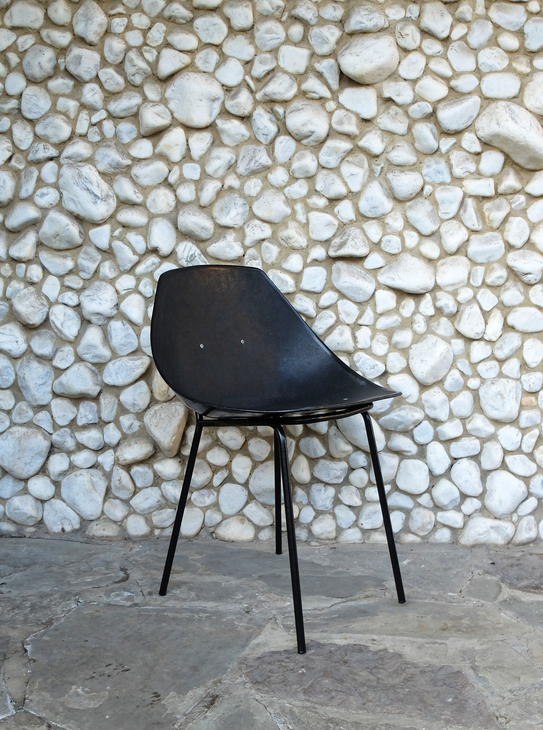 Black shell chair Pierre Guariche for Meurop 1960s