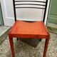 Chair with wooden seat and rare steel back