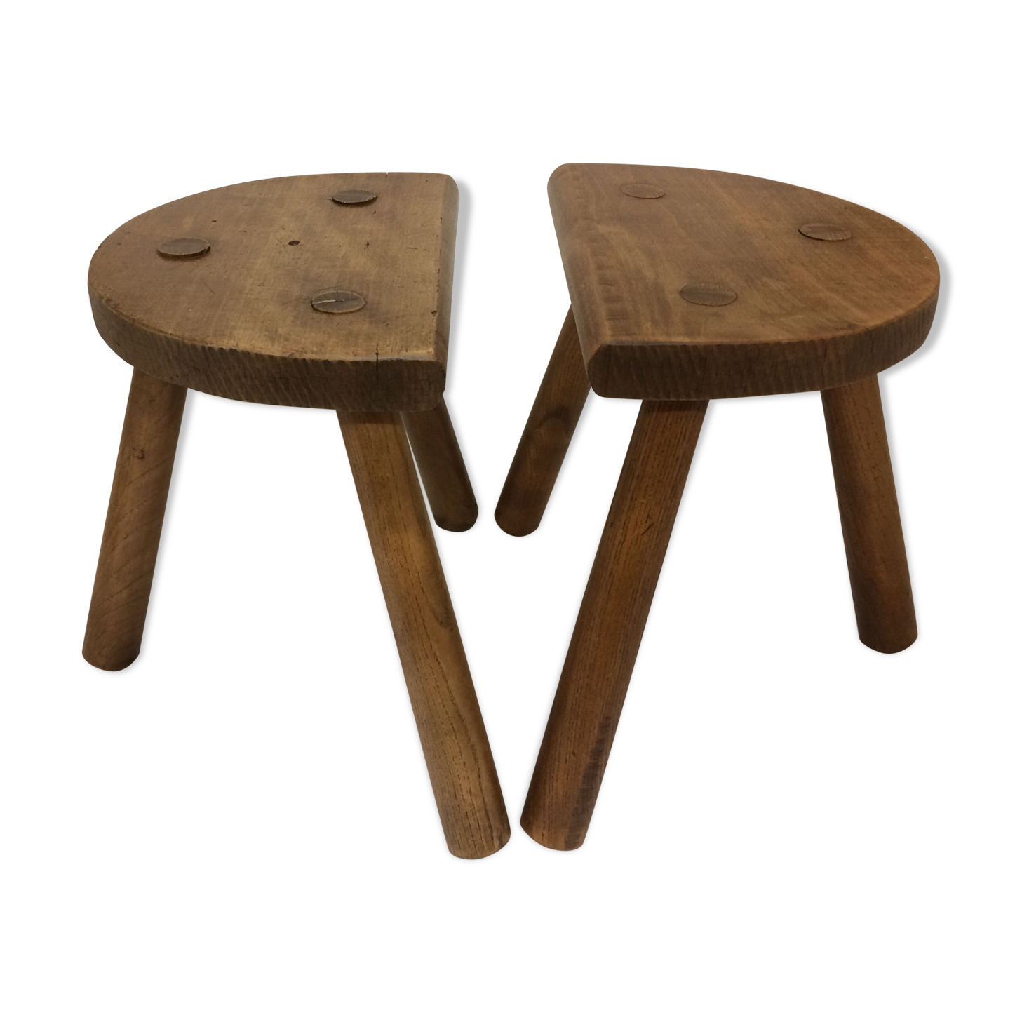 pair of old farm tripod stools