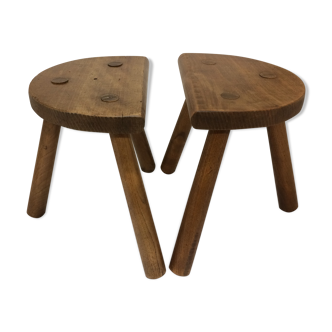 pair of old farm tripod stools